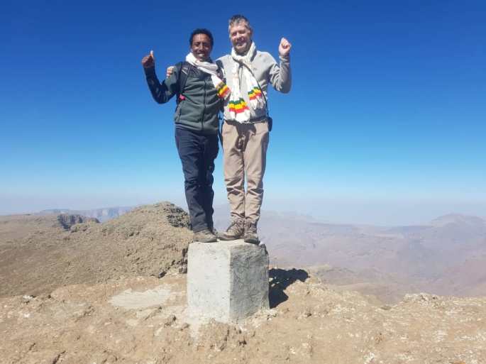 Climbing mountain, two people in Ethiopia